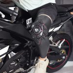genouillère ajustable pour cyclisme et motocyclisme